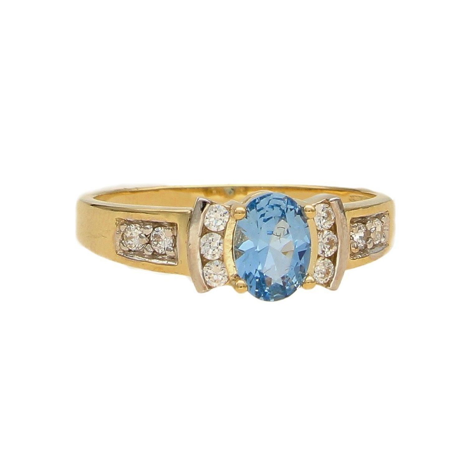 Złoty pierścionek 333 niebieskie oczko i błyszcząca cyrkonia PI 734C 333.jpg